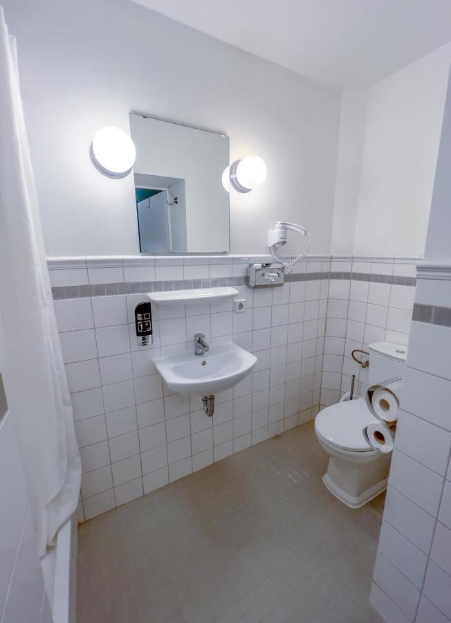 Apartments-Maison Am Olivaer Platz Берлин Экстерьер фото